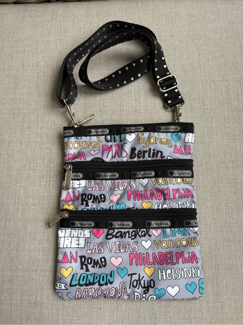 Lesportsac Multi-City Script Print Crossbody in White, Pink, Blue, Yellow, Black